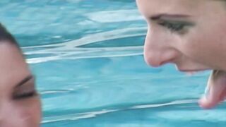 Ebony lesbo blowing foot into a pool 3some