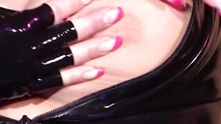 Rubber lesbians fisting their twats