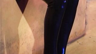 Rubber lesbians fisting their twats