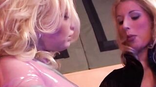 EU lesbians into rubber sharing a sex toy