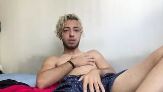 Hot Henry Lynes shows his uncut cock while jerking off in his bedroom