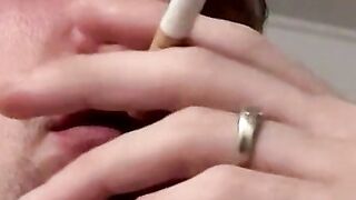 Tattooed skinny dude smoking and shooting cum on the floor