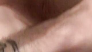 Tattooed skinny dude smoking and shooting cum on the floor