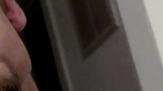 Tattooed skinny dude smoking and shooting cum on the floor