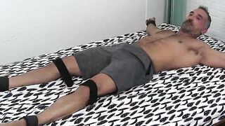 Handsome mature amateur endures tickling torment from dom