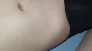 Masked amateur with brown curls inside homemade