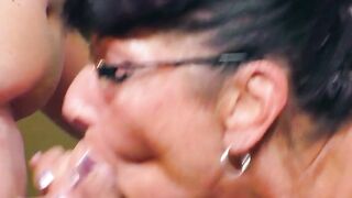 Old woman wearing glasses tests cock pump on bro