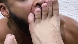 Hairy hunk Ricky Larkin feet worshiped by handsome black gay