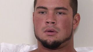 Muscular soldier Brad Banks jerks off his big cock solo