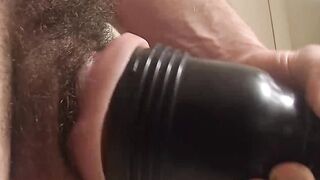 Hairy straight jock plays around with a pocket pussy solo