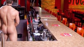 Buff stud strips nude to masturbate passionately behind bar