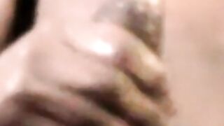 Young black amateur strokes his lubed up BBC and cums