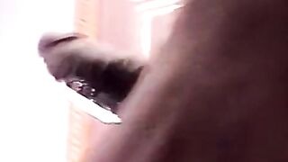 Young black amateur strokes his lubed up BBC and cums