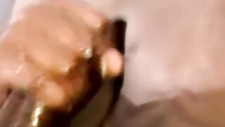 Young black amateur strokes his lubed up BBC and cums