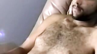 Hairy young amateur masturbates and cums solo on camera