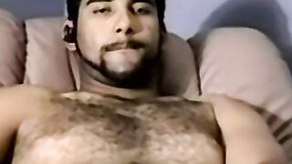 Hairy young amateur masturbates and cums solo on camera