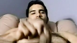 Hairy young amateur masturbates and cums solo on camera