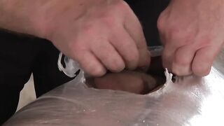 Young kinky slave is helpless and tied up during a handjob