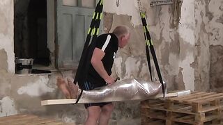Young kinky slave is helpless and tied up during a handjob