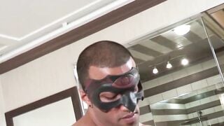 Black stud strips to reveal his fat cock before jerking off