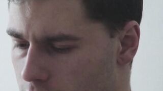 Handsome muscled jock Sam Cuthan jerks off his thick cock