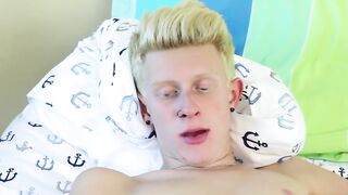 Blond twink sensually tugs on his dick and drills his ass