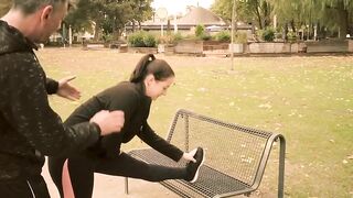 Fitness coach seduces young woman while doing sports