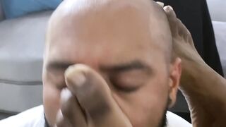 Bearded black stud licks his bosses feet while masturbating