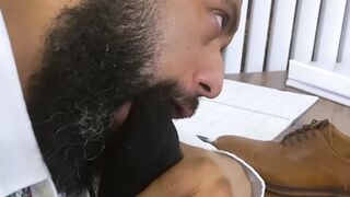 Bearded black stud licks his bosses feet while masturbating