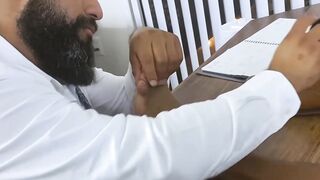 Bearded black stud licks his bosses feet while masturbating
