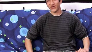 Interviewed young twink jerks off his big dick and cums