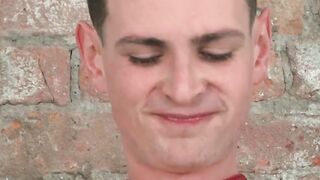 Gorgeous young twink receives handjob while bound to a chair
