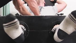Restrained blond young hunk tickle tormented by dominant man