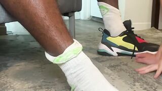 Black hunk got his feet smelled and licked by his friend