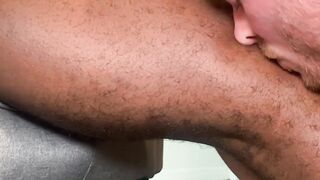 Black hunk got his feet smelled and licked by his friend