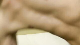Twink enjoys jerking while getting it in a bareback action