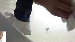 Japanese are gotten on tape while peeing in open latrine