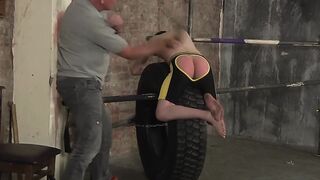 Young gay masturbates while being spanked by an older man