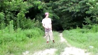 Cute straight guy Sean Johansen works on his dick in nature