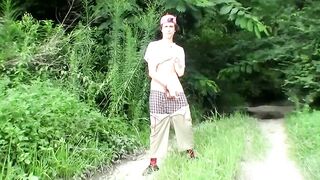 Cute straight guy Sean Johansen works on his dick in nature