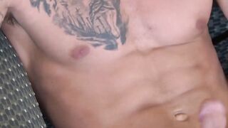 Tattooed athletic soldier Kevin Daniels strokes his cock