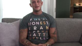 Buff military gay strips on the couch and jerks his dick off