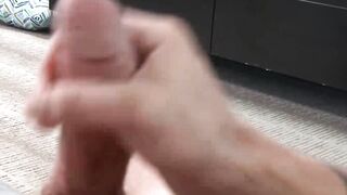 Buff military gay strips on the couch and jerks his dick off
