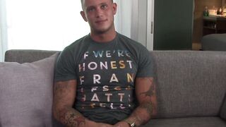 Buff military gay strips on the couch and jerks his dick off