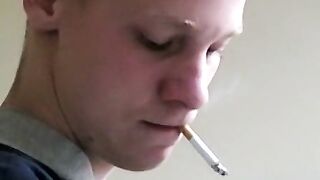 Twink savors the pleasure of smoking and stroking cock