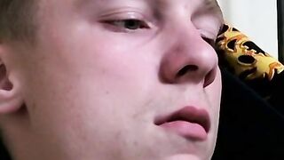 Twink savors the pleasure of smoking and stroking cock