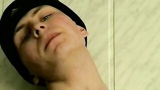 Smoking Twink caresses his cock in an exciting manner