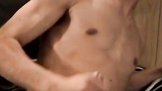 Young fit dude Evan Heinze shows off his massive cock in the camera