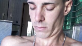 Inked guy Tattoo Boy strokes his cock intensely after a short photoshoot