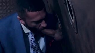 Classy hunk sucks a gloryhole cock before being hammered